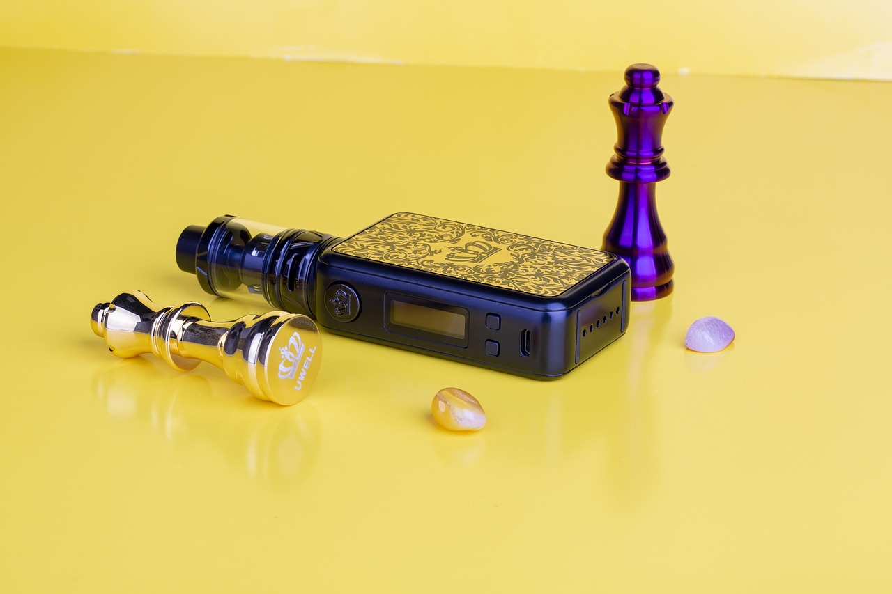 Assorted vape accessories including drip tips, cables and cases